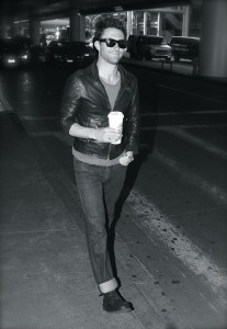 Adam Levine arrives with a cup of Java